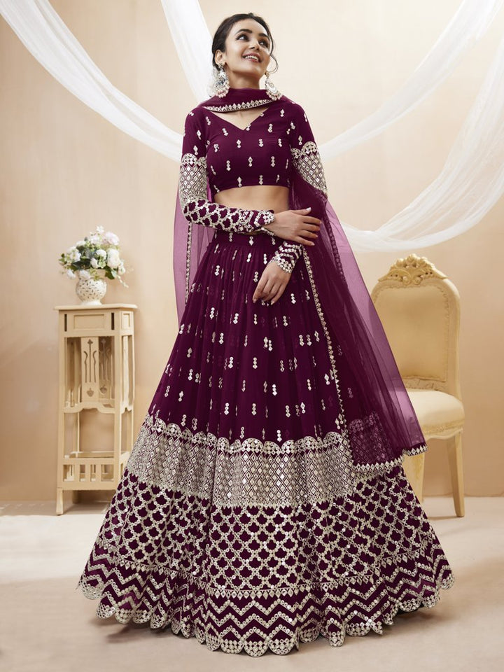 Beautiful wine lehenga choli set in georgette with intricate sequins and zari embroidery, perfect for cultural events.