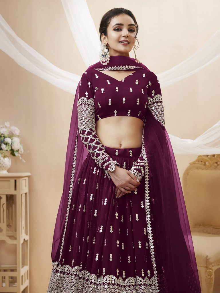 Graceful wine georgette lehenga with sequins and zari detailing, designed for elegant weddings and parties.