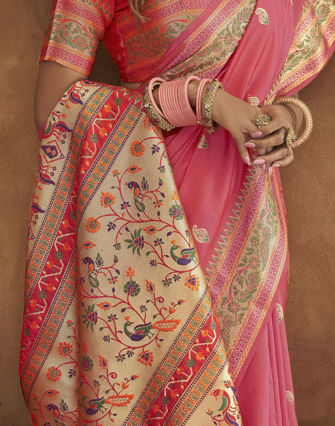 Timeless pink Pethani silk saree with gold zari work and Meenakari border for grand celebrations.