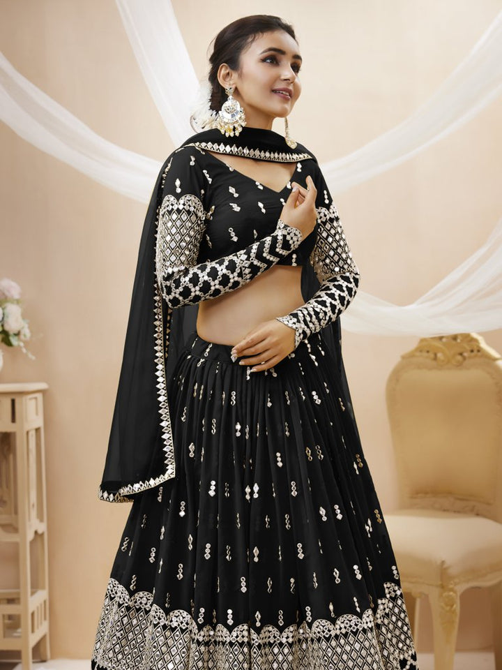 Stunning black lehenga choli in georgette fabric with intricate sequins and zari embroidery, ideal for festive events.