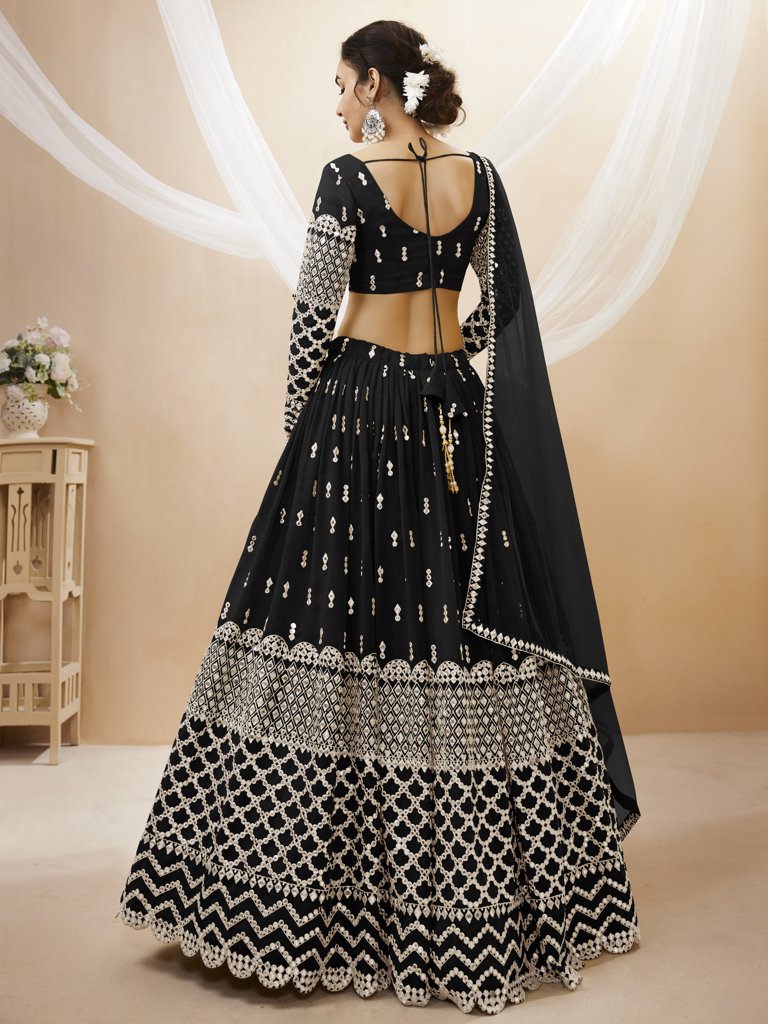 Gorgeous black georgette lehenga set with exquisite sequins and zari detailing, perfect for cultural gatherings.