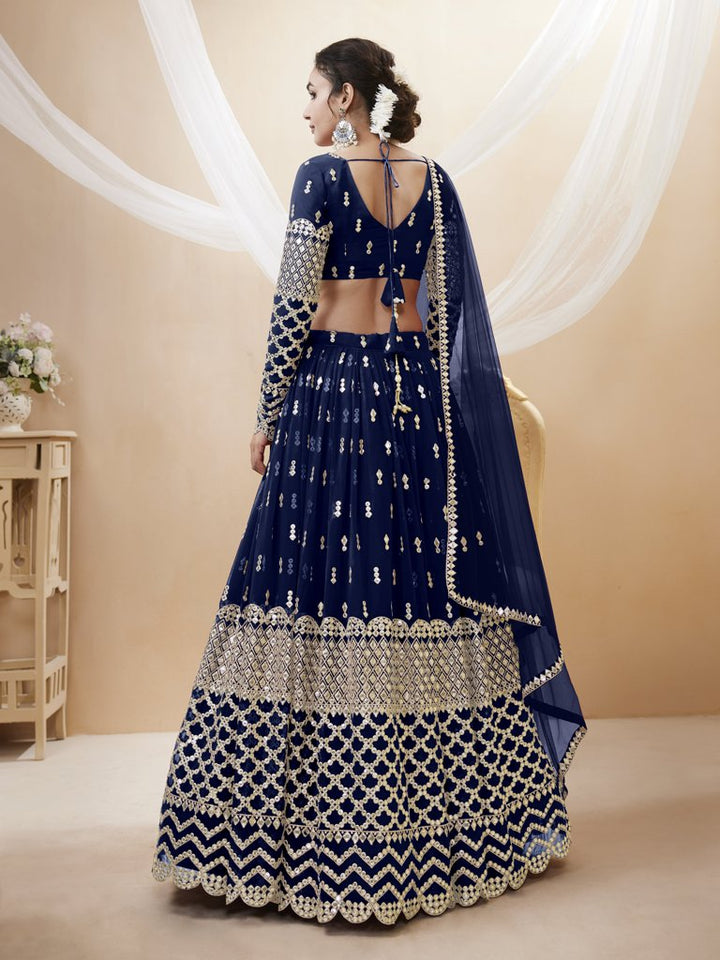 Gorgeous navy blue georgette lehenga set with delicate sequins and zari detailing, perfect for bridal occasions.