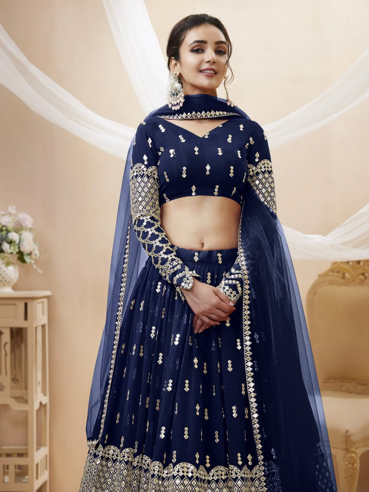 Beautiful navy georgette lehenga with intricate sequins and zari work, ideal for luxurious celebrations.