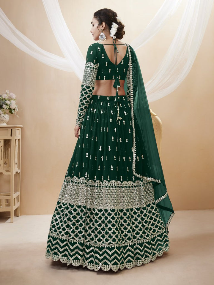 Stunning green georgette lehenga with exquisite sequins and zari work, perfect for cultural and bridal events.