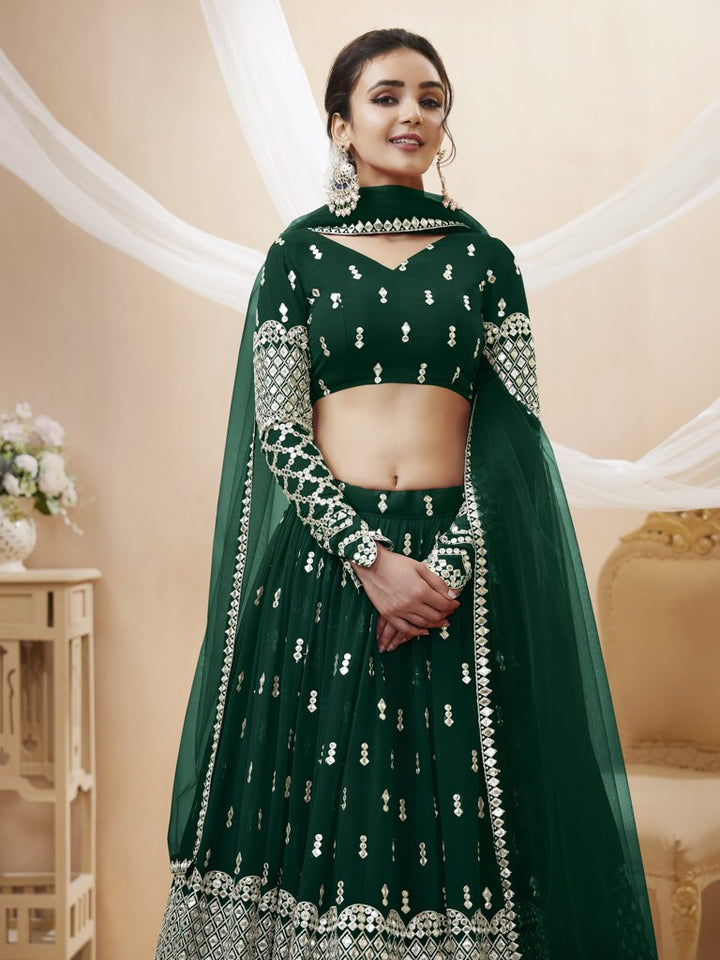 Beautiful green georgette lehenga set with intricate sequins and zari embroidery, ideal for evening wear.