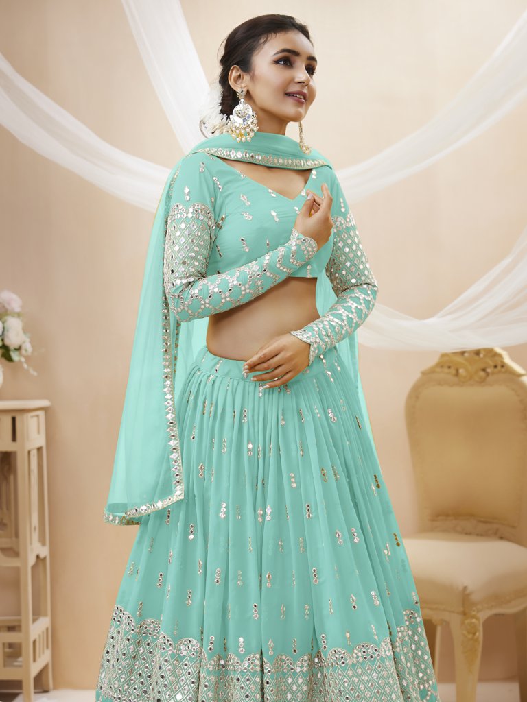 Stunning sky-blue lehenga choli in georgette fabric with intricate sequins and zari detailing, ideal for festive occasions.