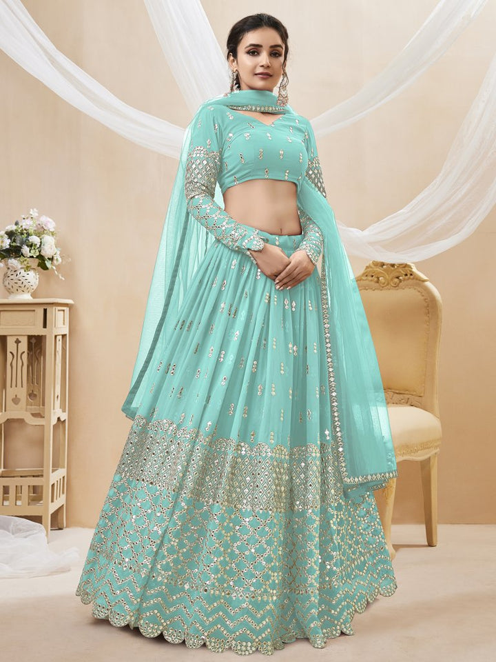 Beautiful sky-blue lehenga choli set with sequins and zari embroidery, ideal for bridal and festive events.