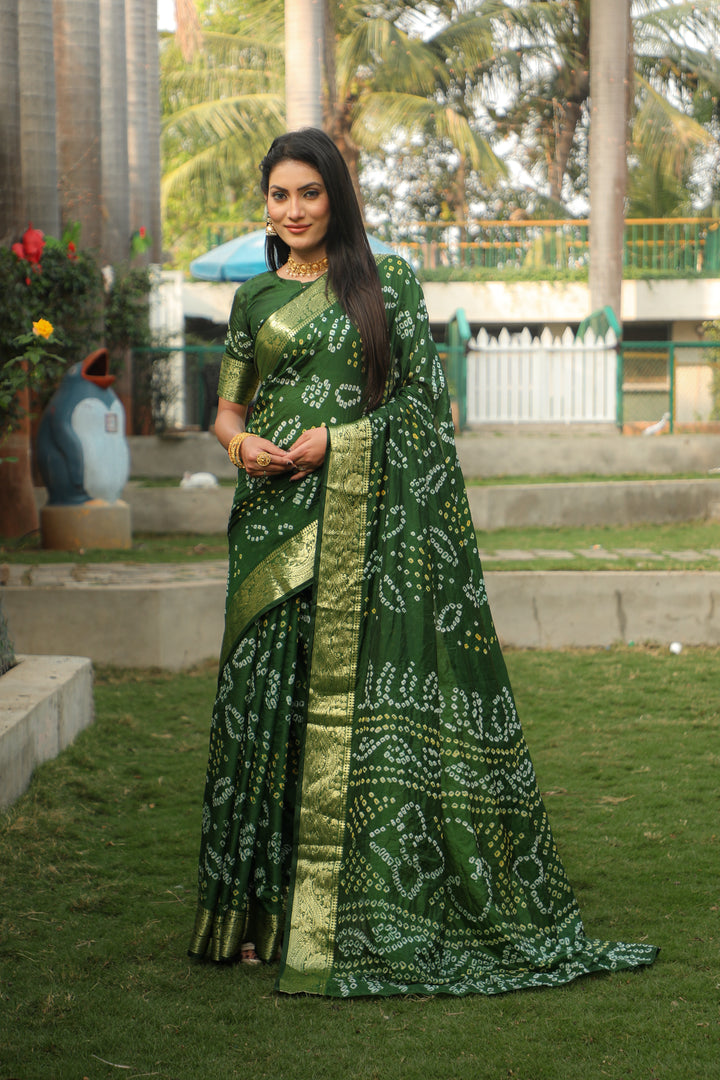 Vibrant green Bandhej silk saree with a beautiful jari weaving border and Bandhej pallu, perfect for celebrations.