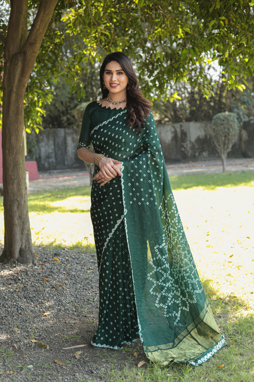 Green Premium Bandhej Silk Saree with Zari weaving and Pallu, perfect for cultural celebrations.