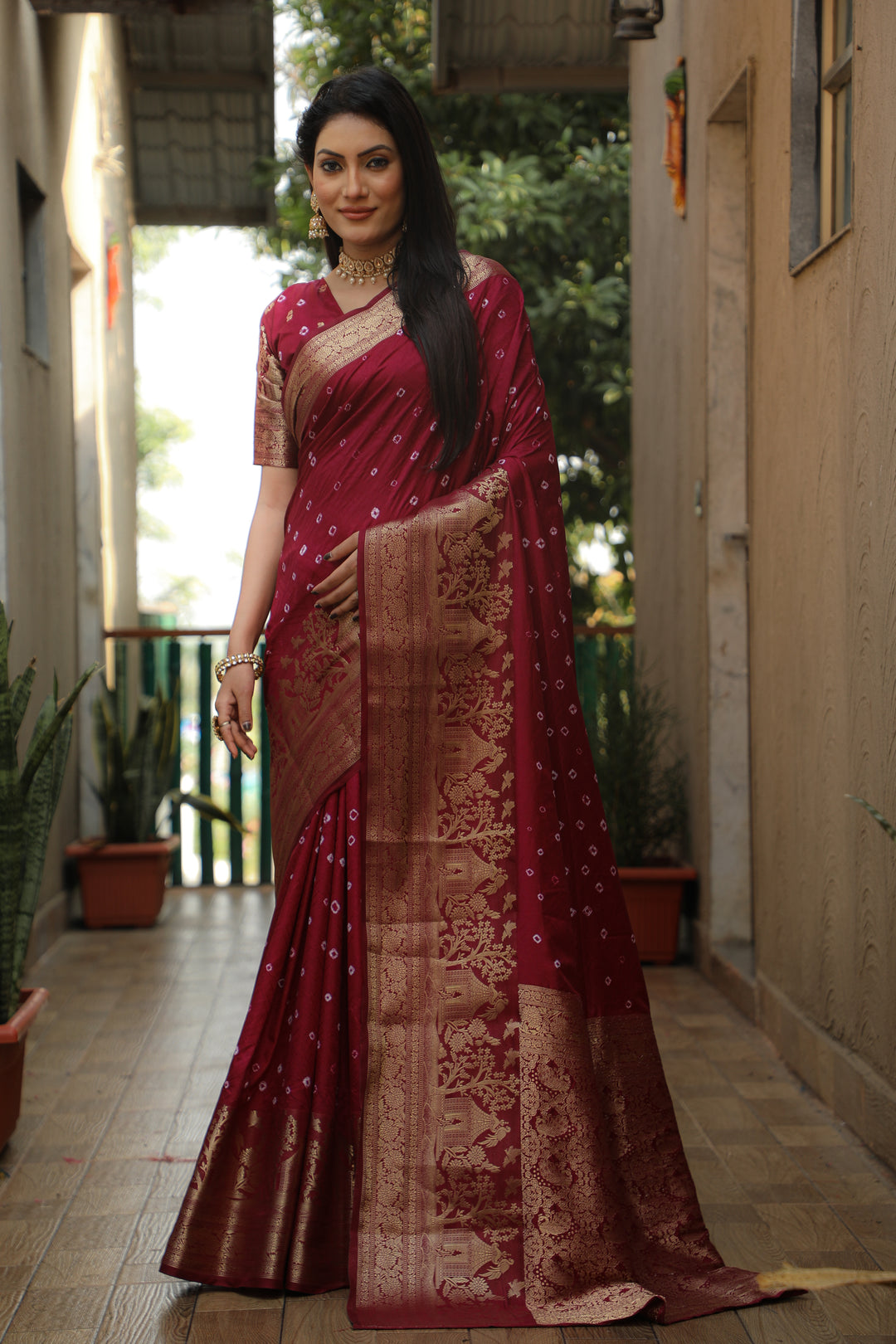 Elegant red Kanjivaram silk saree with intricate work and rich pallu, ideal for grand celebrations.