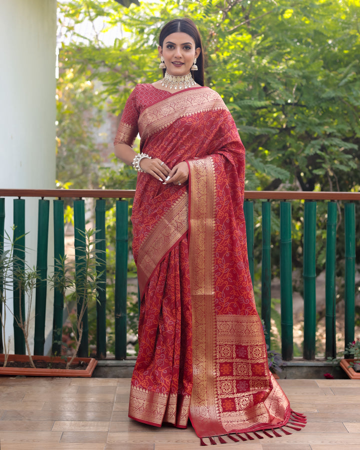 Bright-pink Handloom Bandhej Patola Silk Saree with exquisite Zari & Kanchi Borders, perfect for USA weddings.