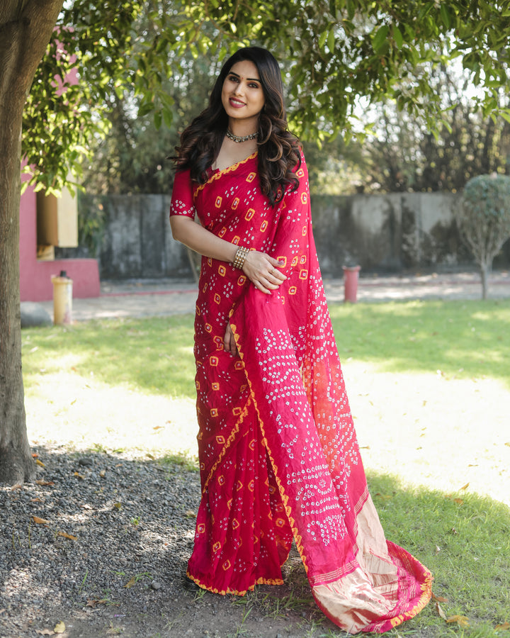 Fashionable Bandhej silk saree with vibrant tissue pallu and elegant zari weaving.