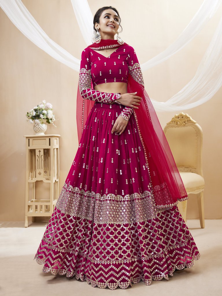 Stunning bright-pink georgette lehenga set with sequins and zari detailing, perfect for festive celebrations.