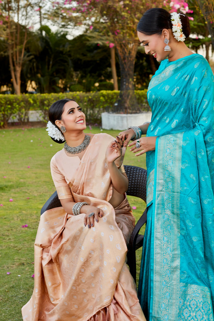 Timeless beige satin silk Kanjivaram saree with intricate woven pallu, ideal for formal and cultural events.