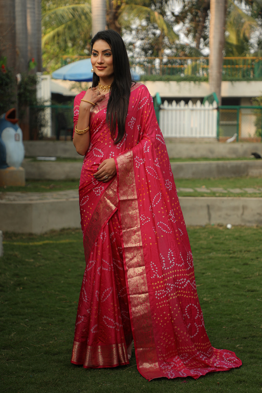 Gorgeous green Bandhej silk saree with a stunning jari weaving border and Bandhej pallu, ideal for festive occasions.