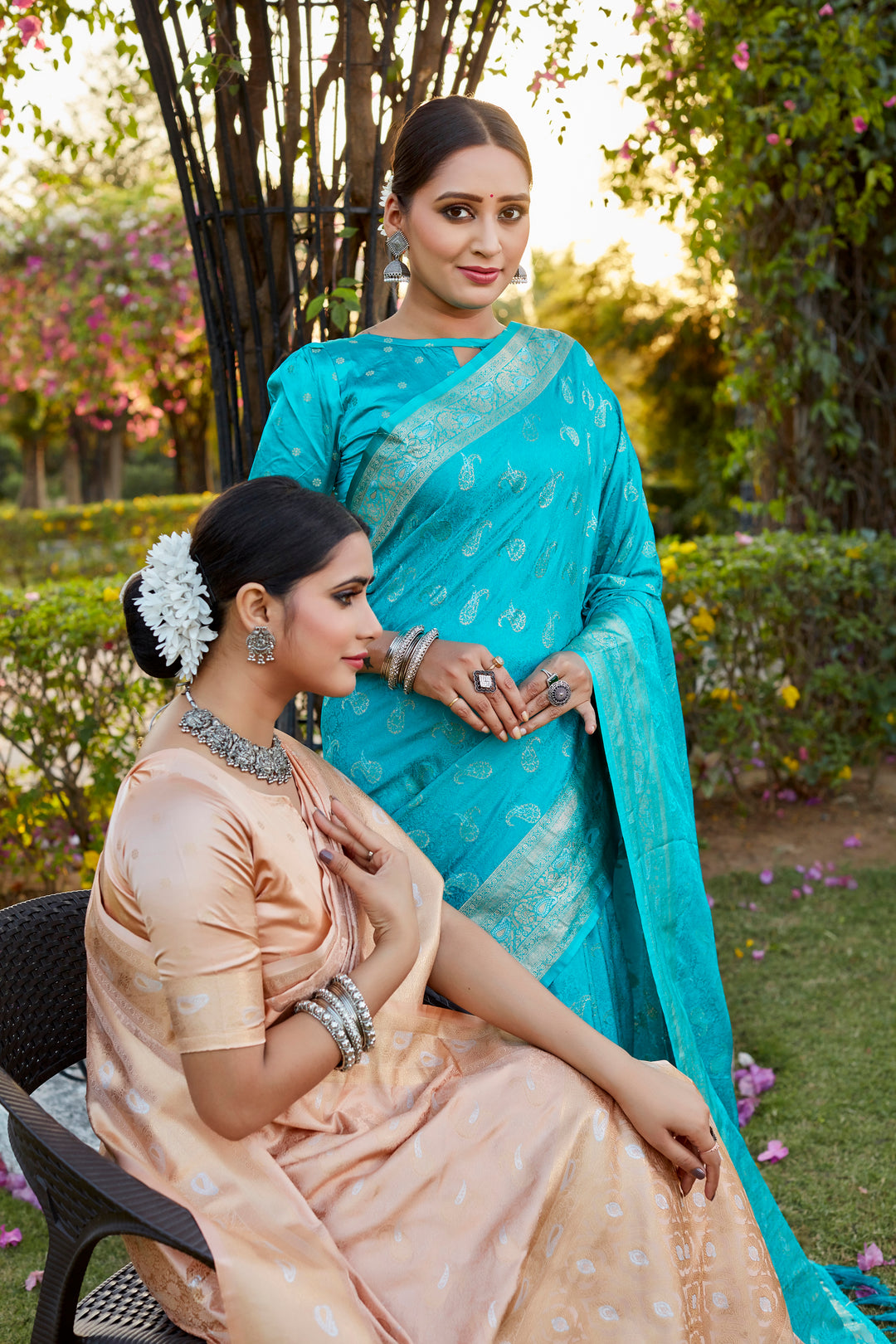 Stunning sky-blue satin silk Kanjivaram saree with woven pallu and delicate butta work, perfect for weddings.