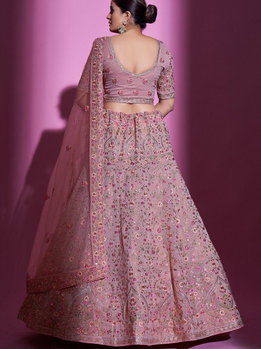 Peach georgette lehenga with Swarovski details and matching choli.