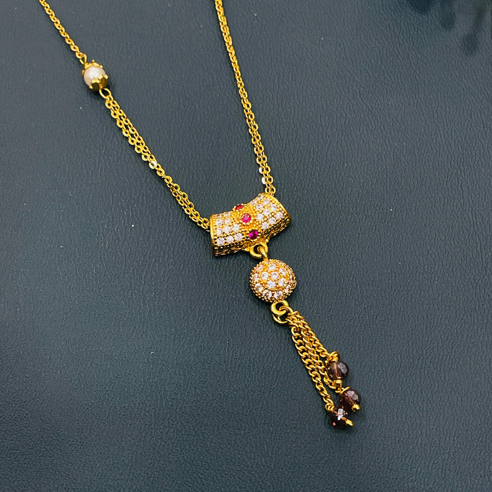 Sophisticated black and gold mangalsutra, gold-plated alloy, perfect for classic elegance.