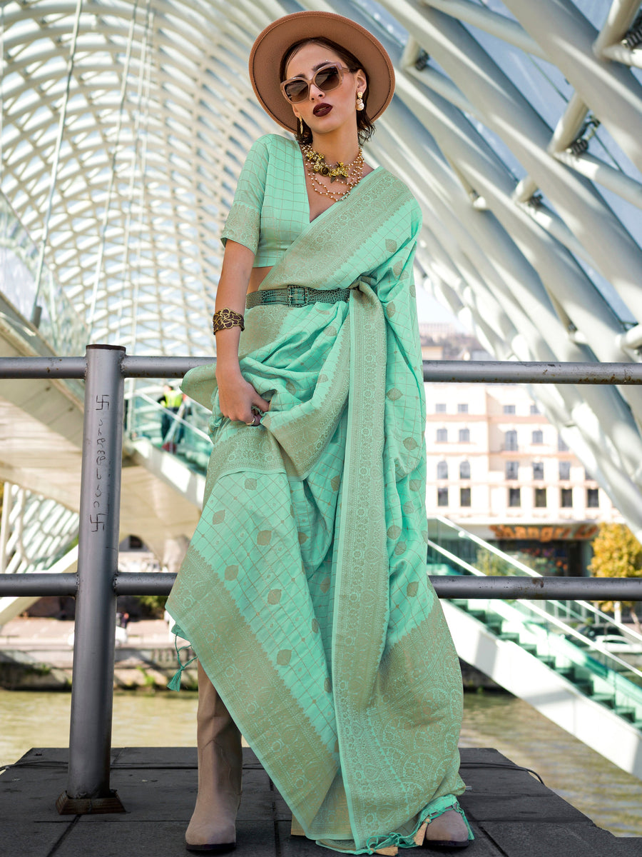 Green silk saree crafted for elegance and style.