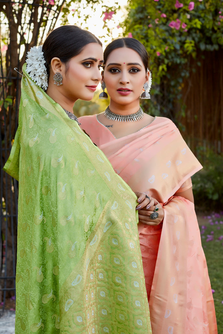 Soft lavender satin silk Kanjivaram saree with exquisite butta design and woven pallu, perfect for special events.