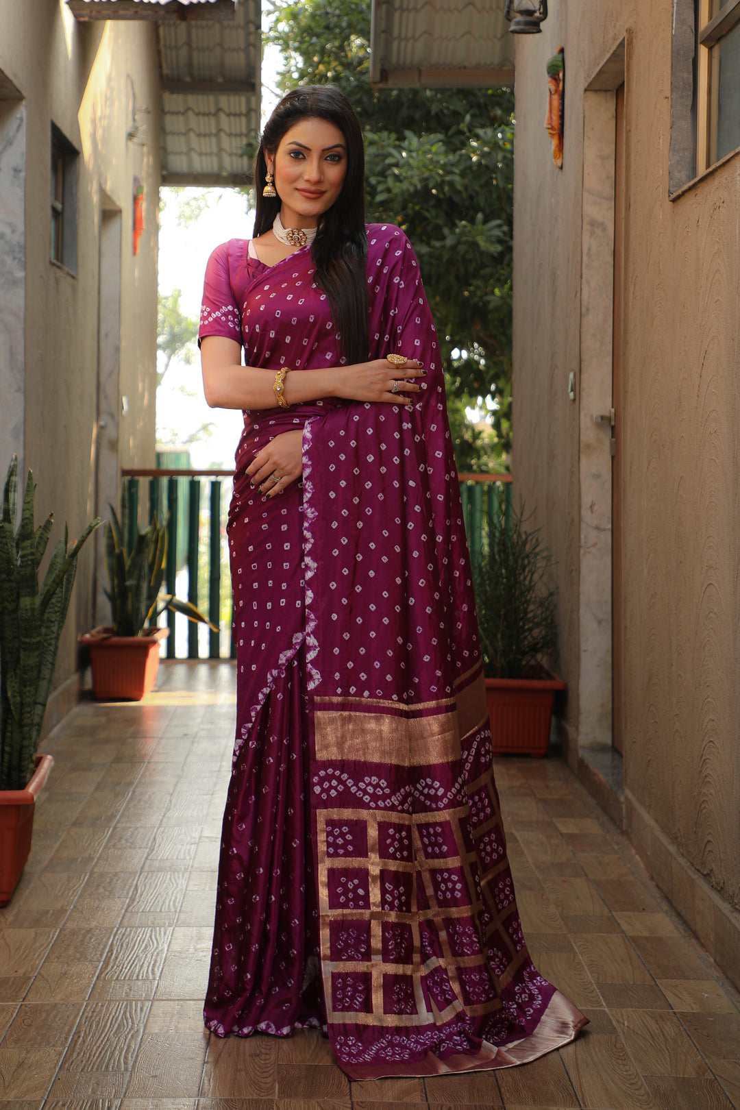 Wine Bandhej silk saree with stylish checks pattern and original Bandhej craftsmanship.