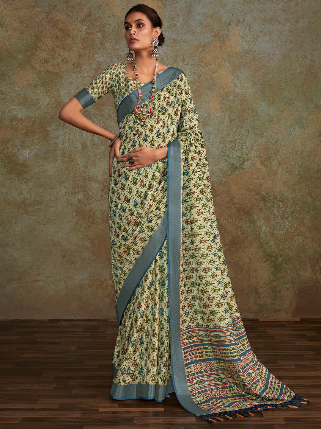 Green silk saree crafted for elegance and style.