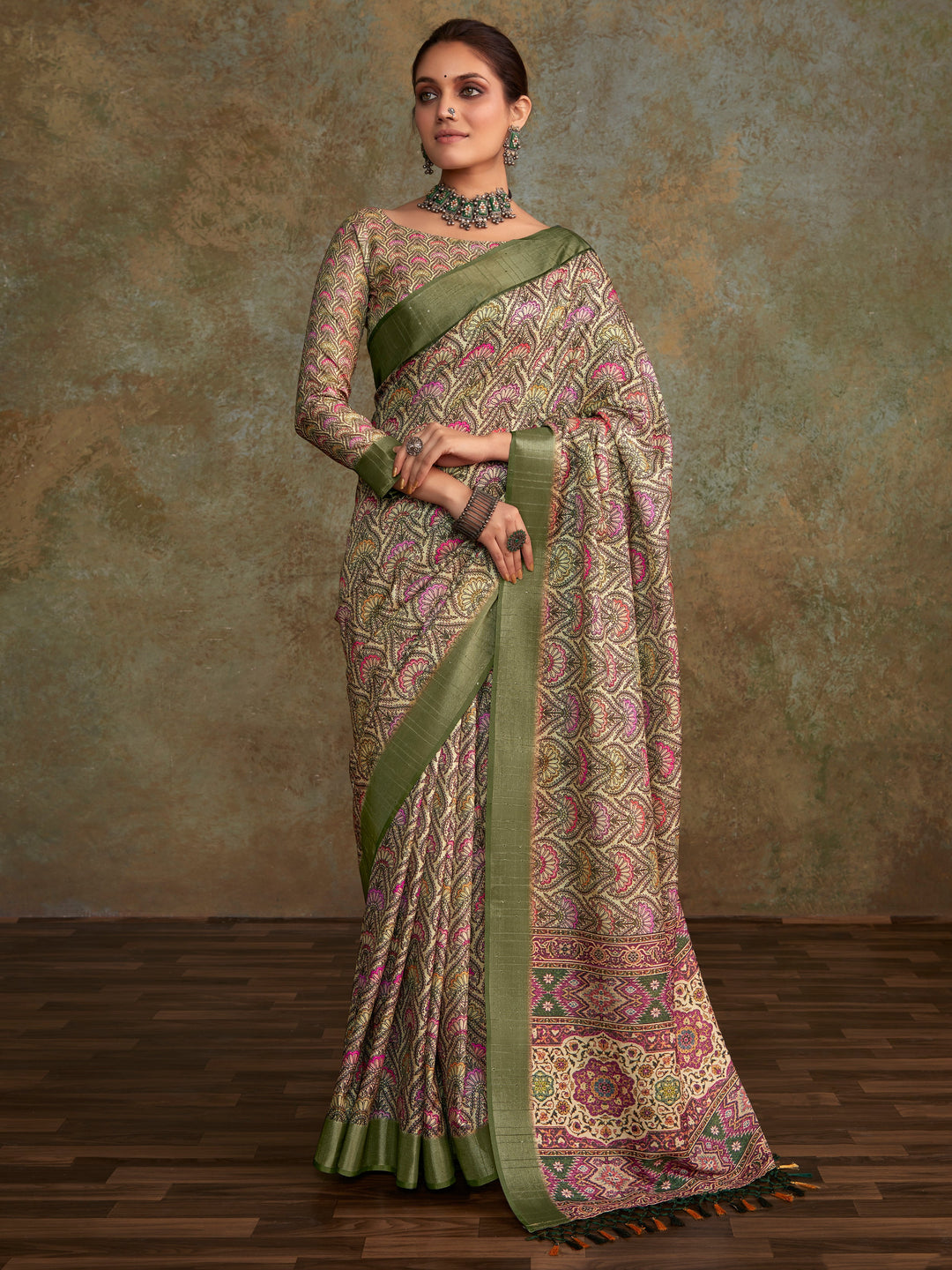 Green silk saree crafted for elegance and style.