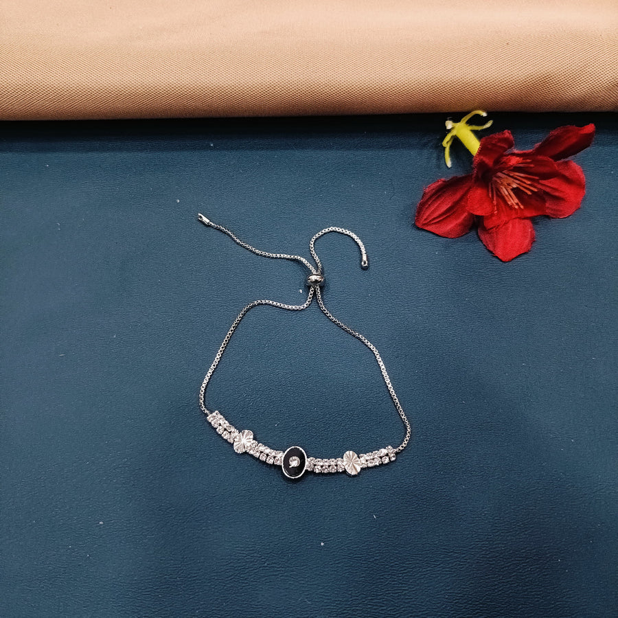 Rustic silver bangle with unique detailing, adding charm to your outfit.