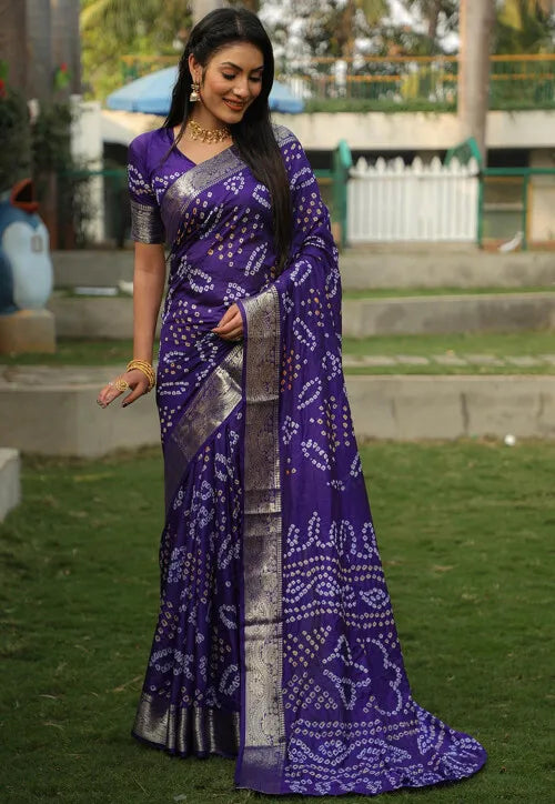 Gorgeous pink Bandhej silk saree with a beautiful jari border and Bandhej pallu, perfect for weddings and festivals.