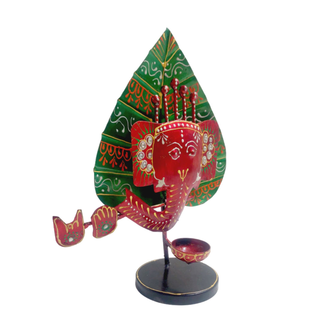 Artisan-crafted Ganesha candle holder in vibrant colors, perfect for celebrations