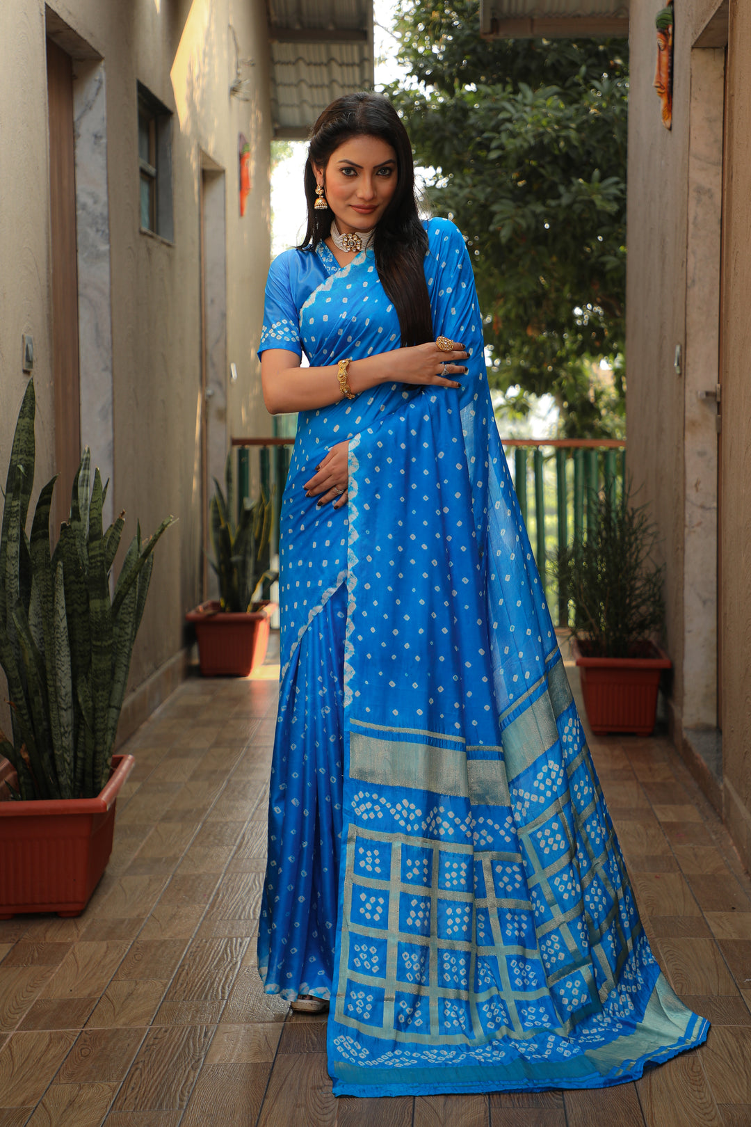 Blue Bandhej silk saree with elegant checks design and original Bandhej craftsmanship.