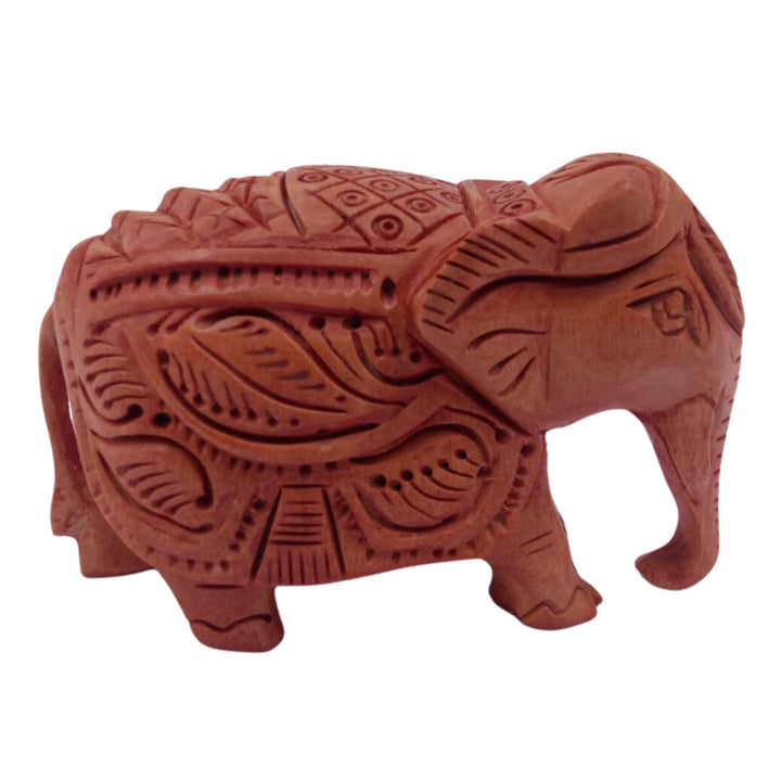 Wooden elephant figurine with down trunk representing wisdom and grace