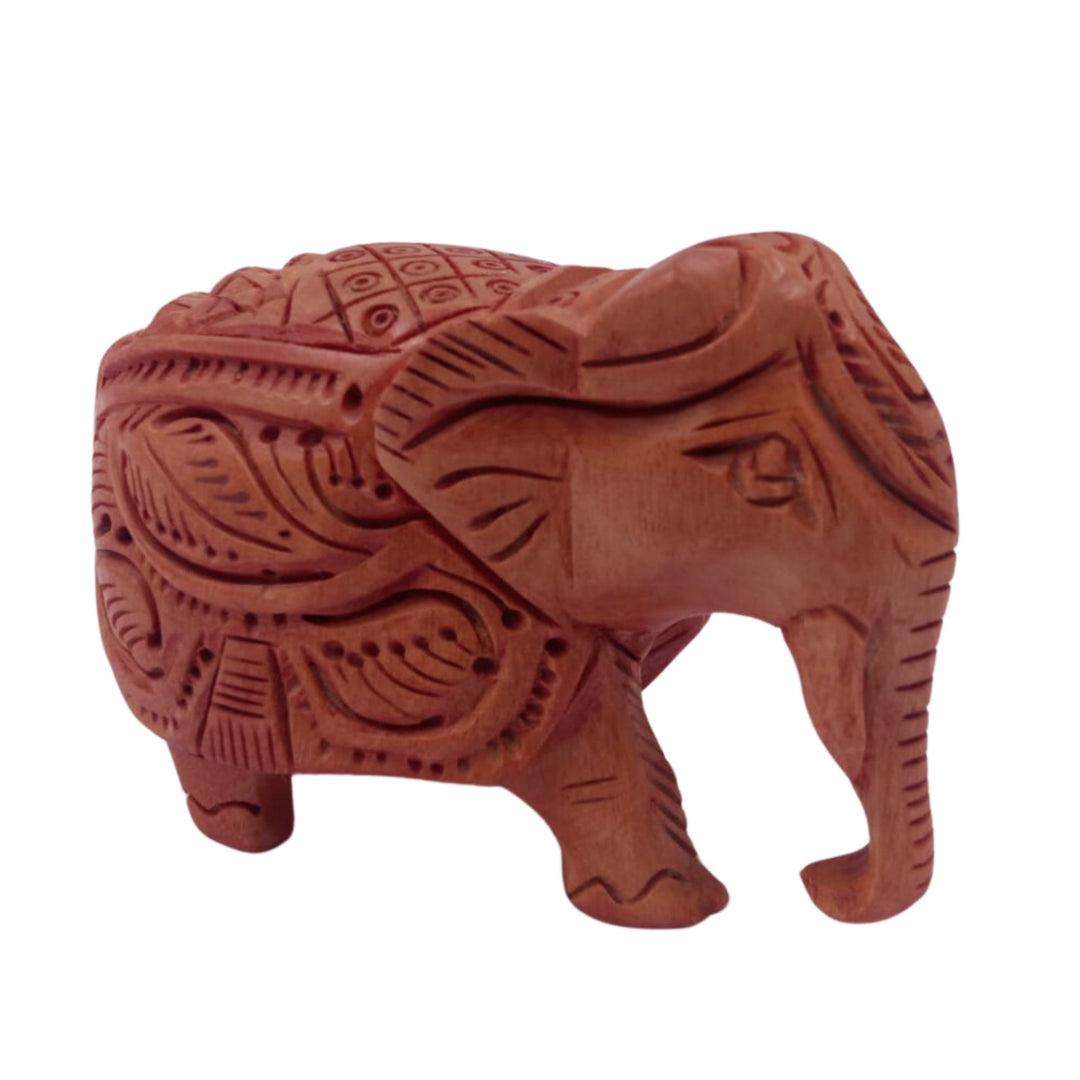 Artistic wooden elephant down trunk decor signifying wisdom and grace