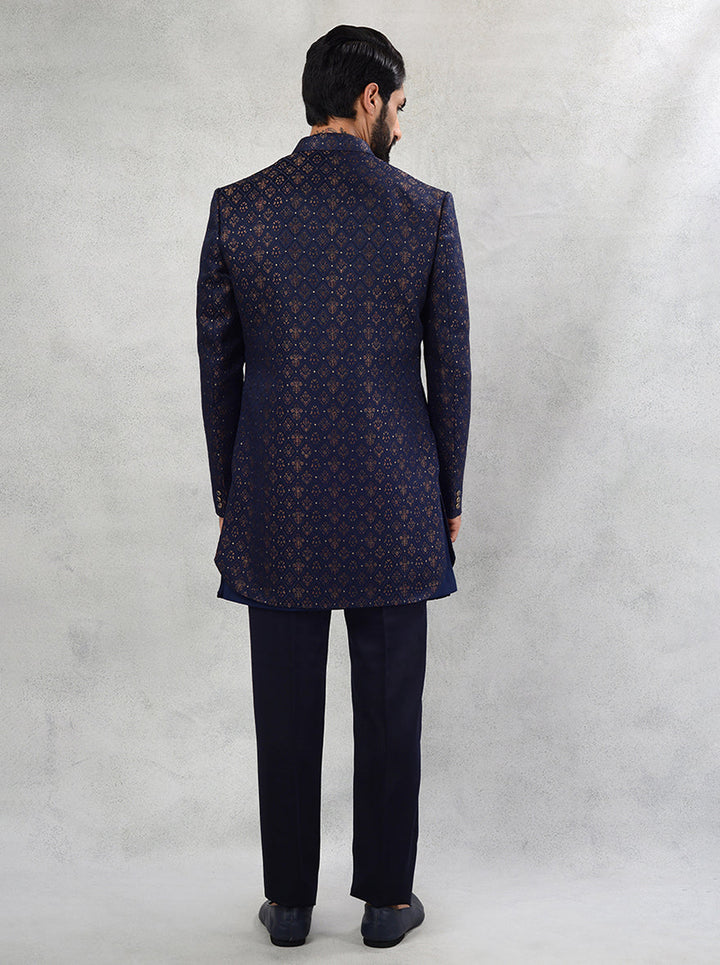 Capture attention at sangeet celebrations with our elegant Navy Blue Indo Western attire, designed for comfort.