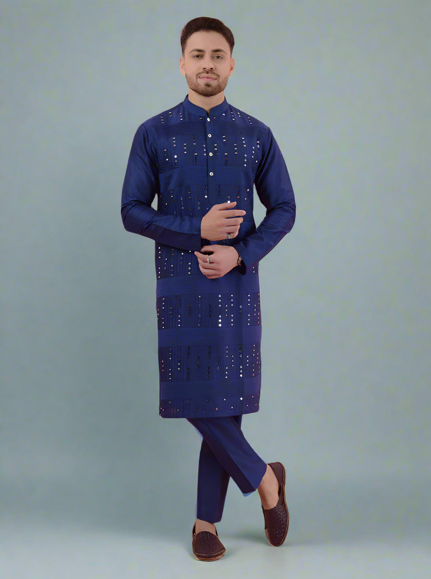 Stylish navy blue kurta pajama for men, featuring detailed embroidery for a classic ethnic look.