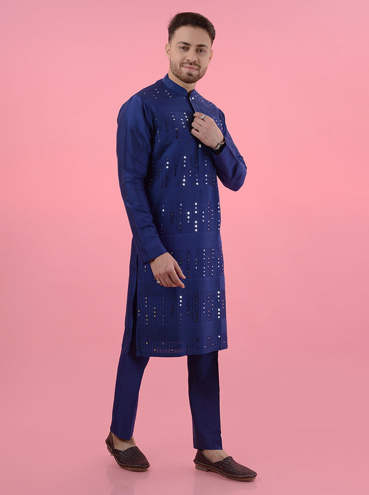 Traditional navy blue kurta pajama for men, with fine embroidery for a sophisticated ethnic style.