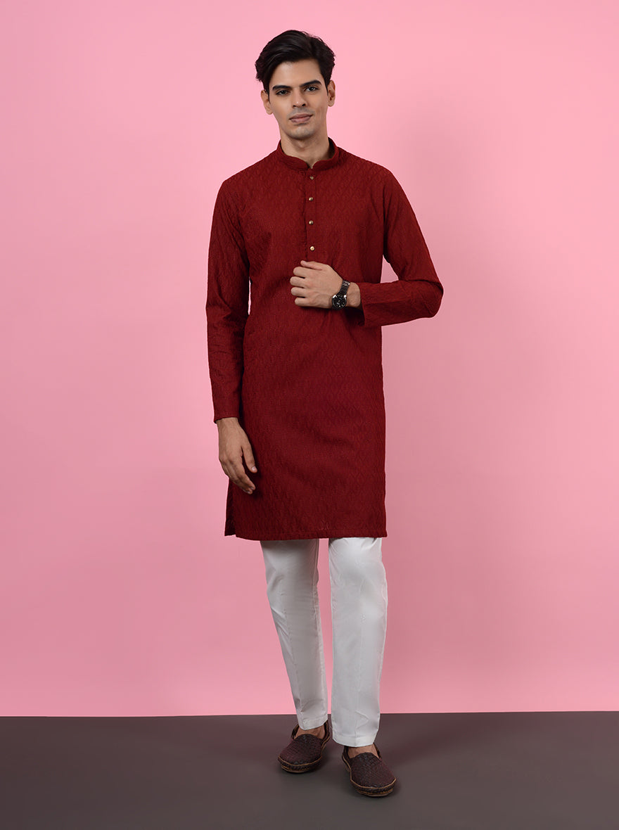 Elevate your ethnic wardrobe with this stylish Red Kurta Pajama designed for celebrations.