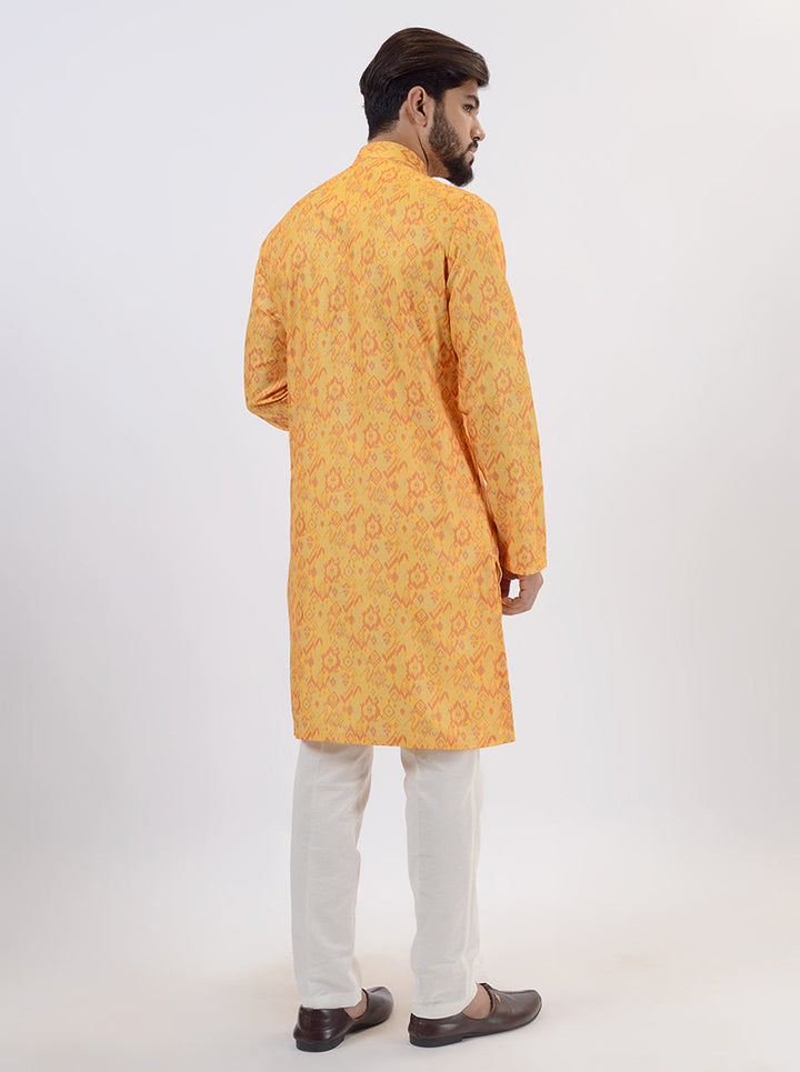 Traditional mustard yellow kurta set for men, designed for weddings and festivals.