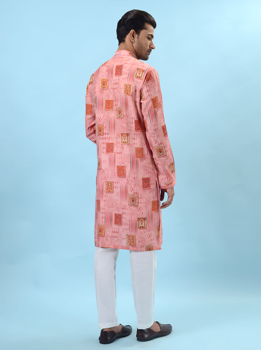 Stylish pink silk kurta for men, ideal for special occasions and festive celebrations.