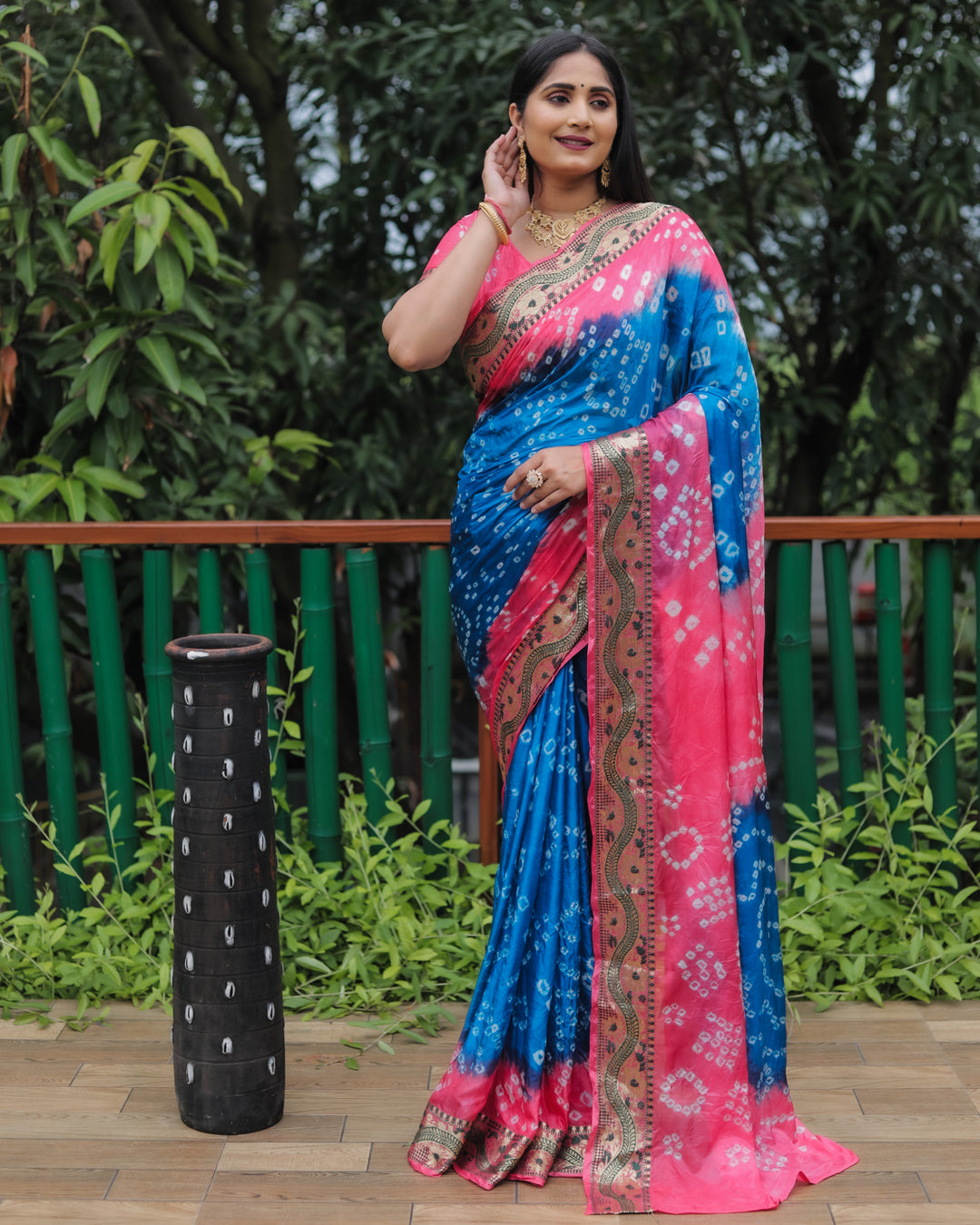 Stunning blue Bandhej Tapeta silk saree with vibrant dual-color pattern for weddings and celebrations.