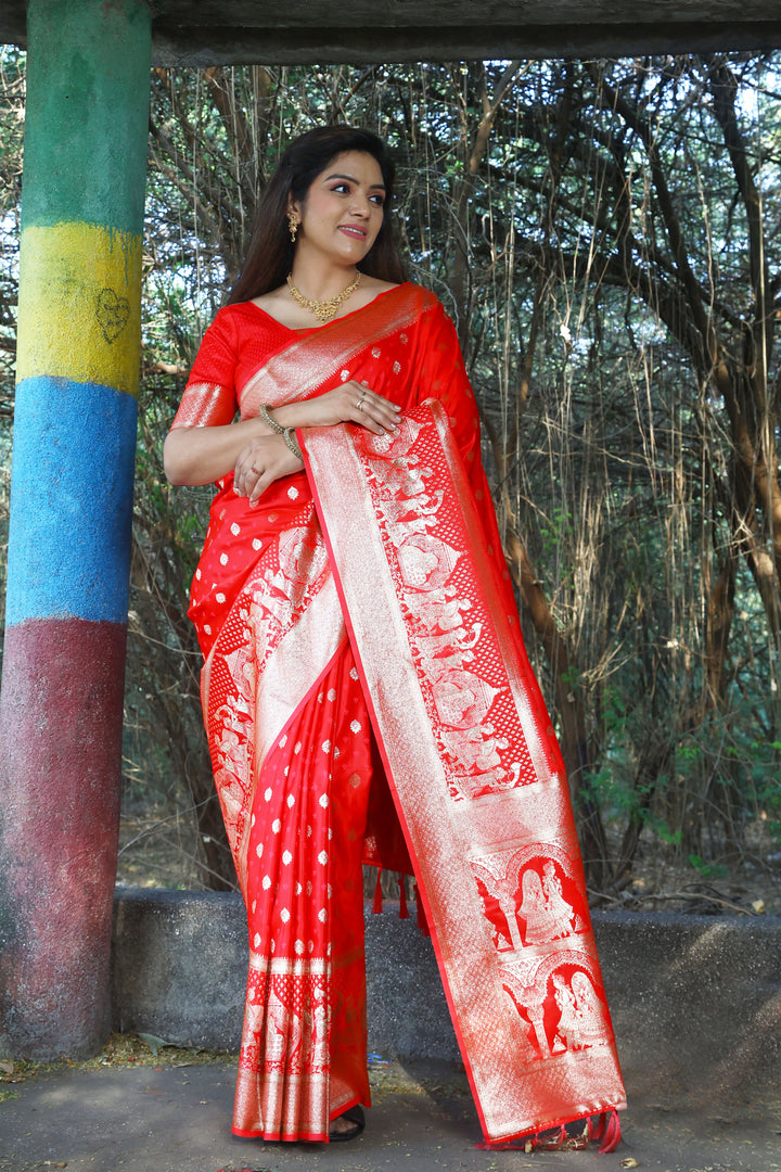 Stunning red satin silk saree with a traditional Kanjivaram design, adding richness to your attire for special events.