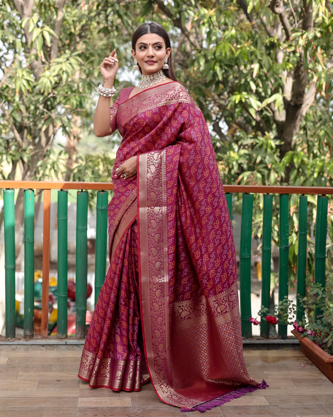 Rich blue Bandhej Patola saree with exquisite zari work and regal Kanchi borders, perfect for festive occasions.