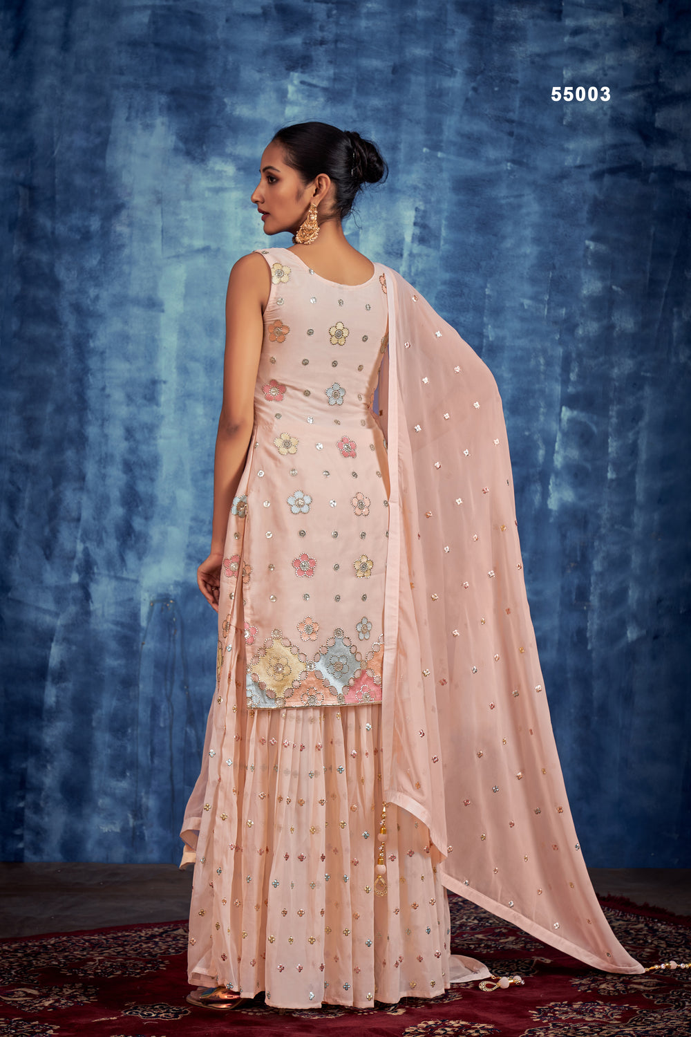 Stunning Peach Gharara Suit with handwork embroidery, crystal stones, and sequins, ideal for festive and wedding wear.