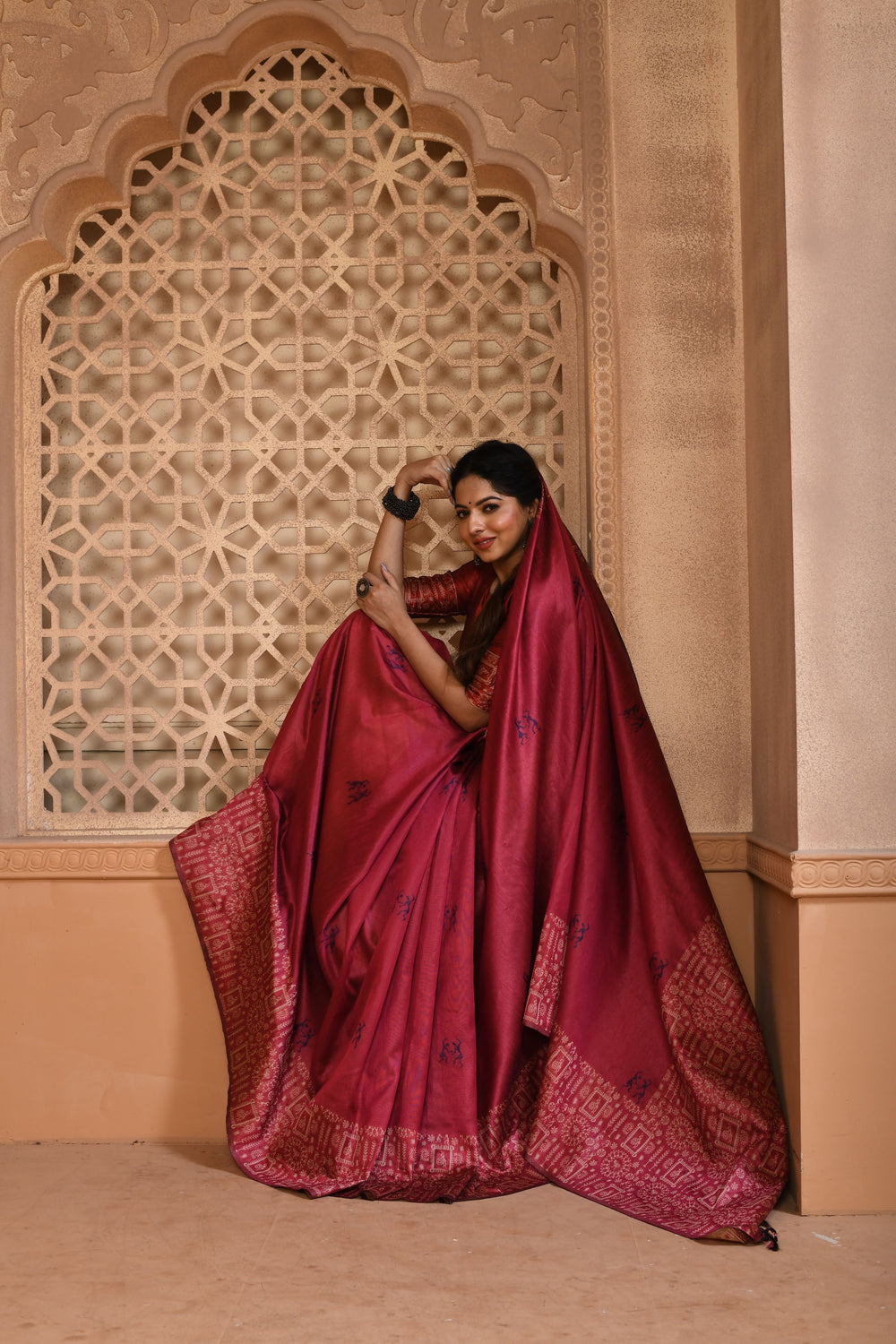 Elegant bright pink handloom raw silk saree with detailed weaving pallu, ideal for festive occasions.