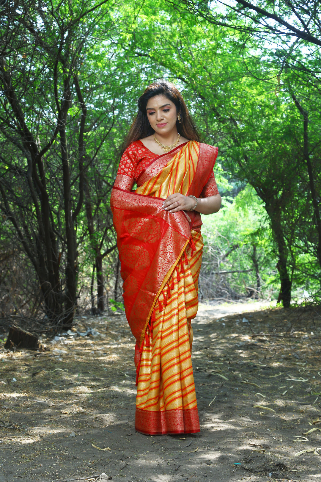 Stunning Yellow Leheriya Silk Saree with Zari weaving and elegant border, ideal for traditional events.