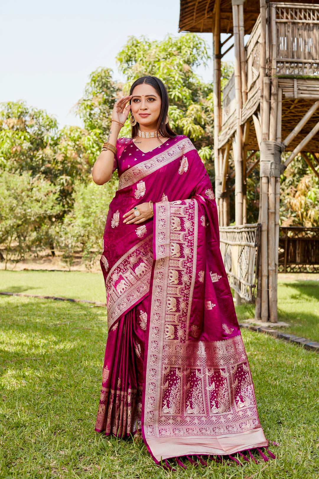 Stunning wine satin Kanjivaram saree with intricate elephant border details, perfect for traditional and cultural gatherings.