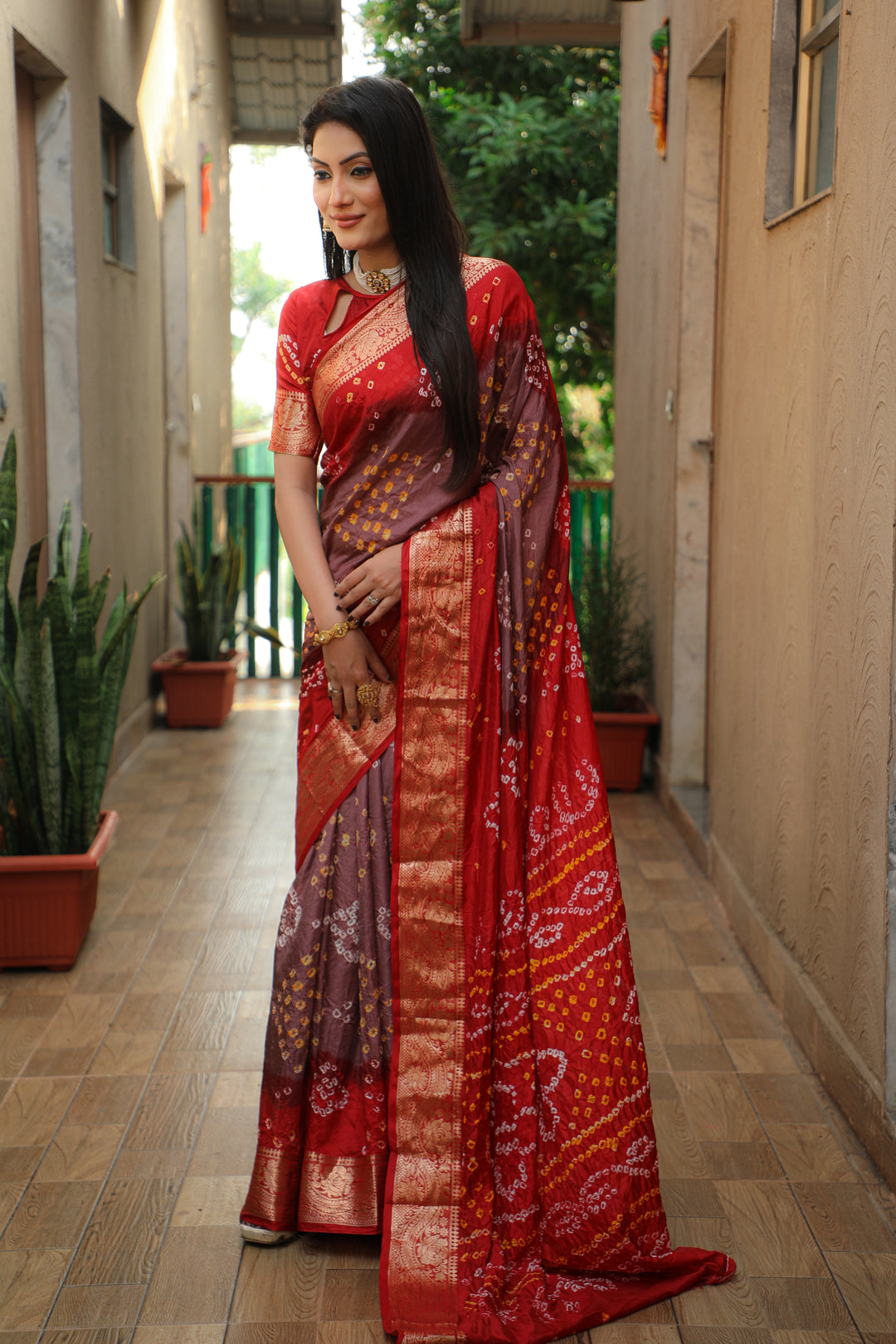 Lightweight Bandhej Tapeta saree in rich red, offering traditional elegance for every occasion.