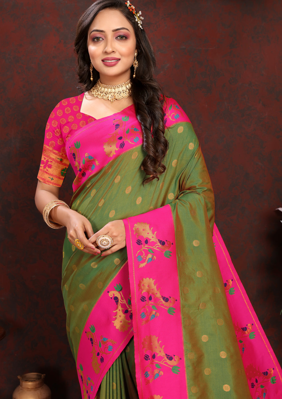 Graceful green Paithani Saree with contrast zari border, ideal for special occasions.