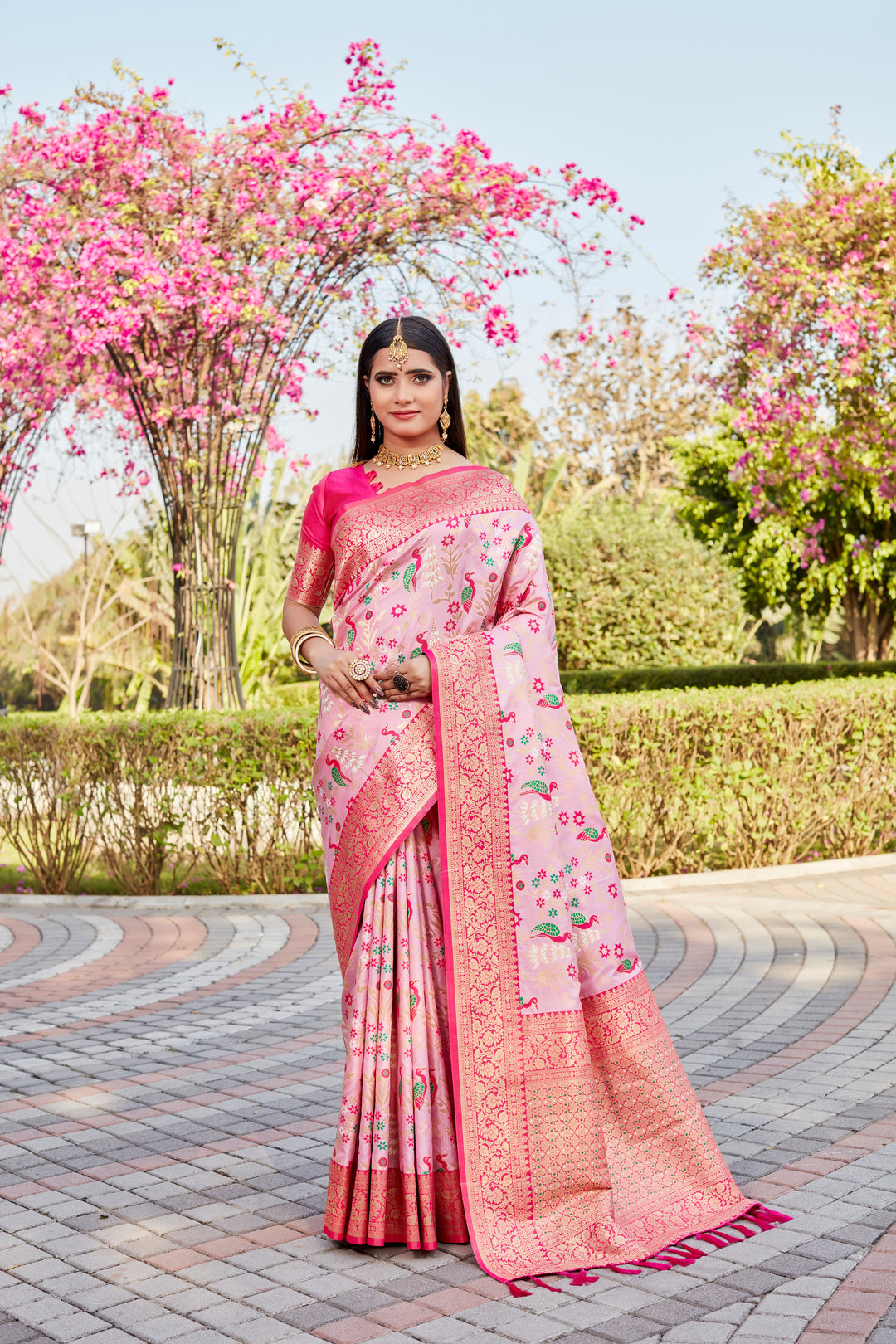 Premium Baby Pink Kanjivaram Soft Silk Saree with beautiful border details for bridal wear.