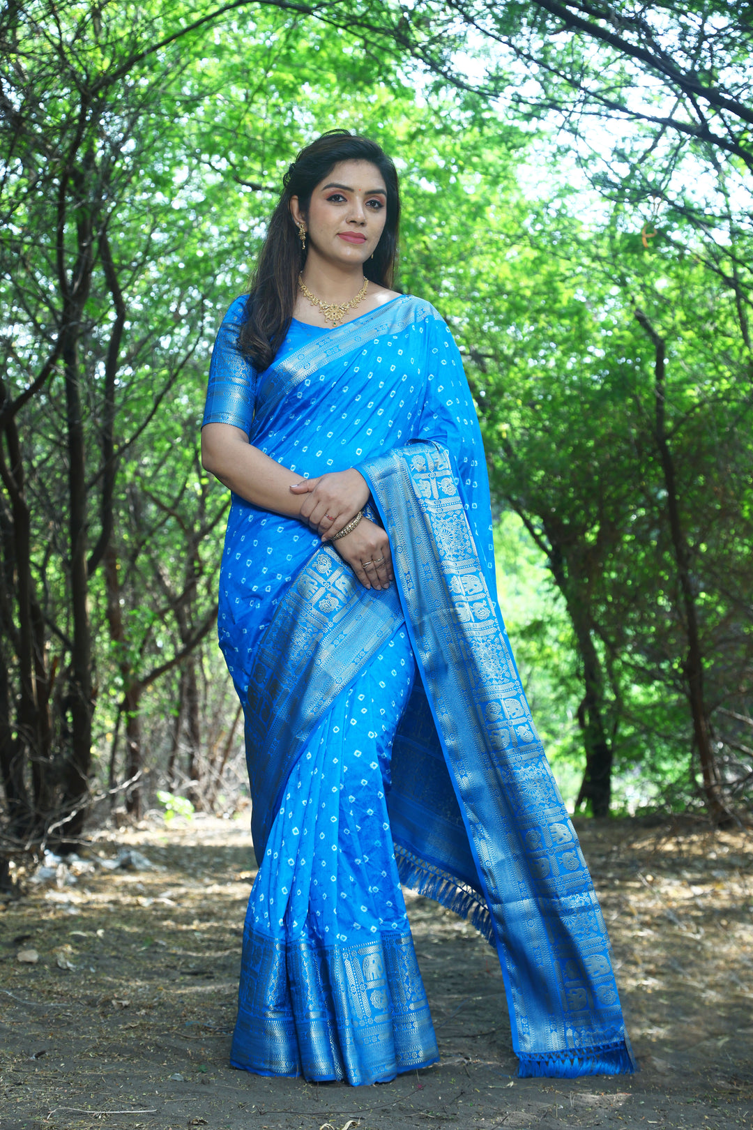 Beautiful blue handmade Bandhej Kanjivaram silk saree with stunning border and pallu, perfect for festive occasions.